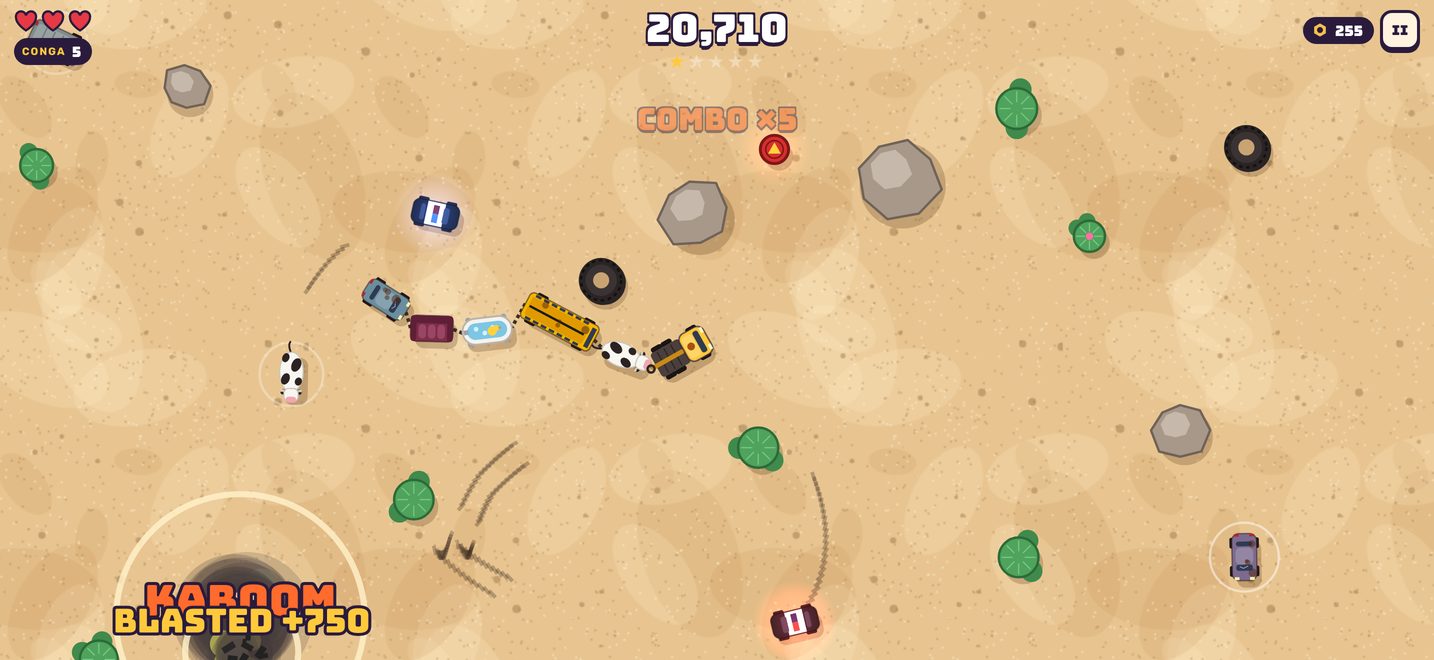 A long conga line of junk weaving between rocks and cacti with police cars in pursuit.